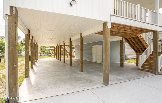 117 NW 17th St, Oak Island, NC 28465 - view of patio / terrace with stairway