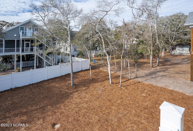 view of yard featuring a sunroom