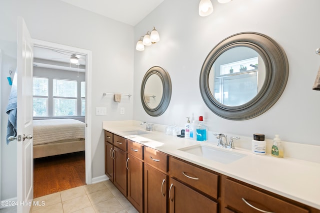 bathroom featuring hardwood / wood-style flooring and vanity