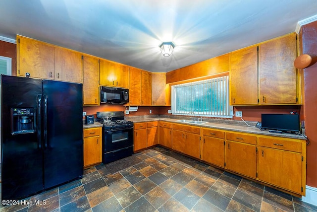 kitchen with sink and black appliances