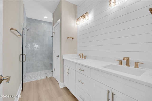 822 Kenneth Ave Unit 1, Carolina Beach, NC 28428 - full bath with a shower stall, wood finished floors, double vanity, and recessed lighting
