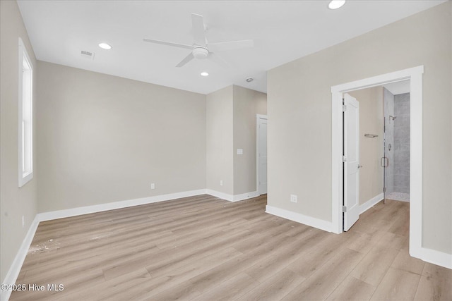 822 Kenneth Ave Unit 1, Carolina Beach, NC 28428 - unfurnished room with a ceiling fan, light wood finished floors, and recessed lighting