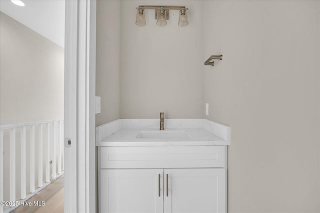 822 Kenneth Ave Unit 1, Carolina Beach, NC 28428 - bathroom with a sink and wood finished floors