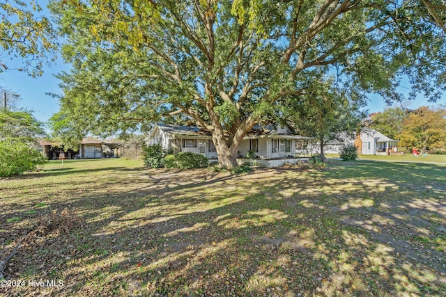 view of front of property with a front lawn