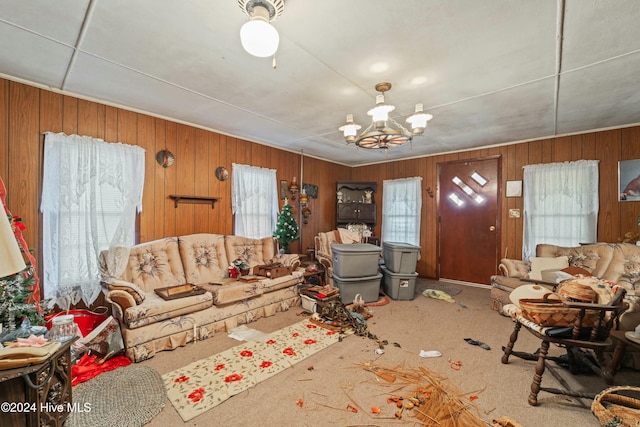 living room with carpet flooring and wooden walls