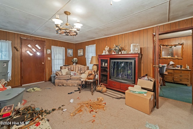 living room with carpet flooring and wood walls