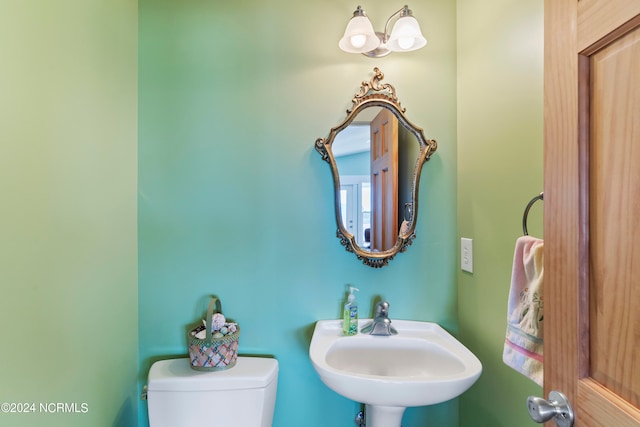 bathroom with sink and toilet