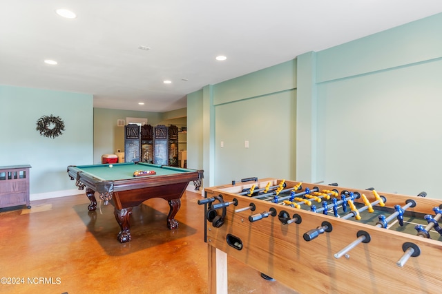 rec room with concrete floors and billiards