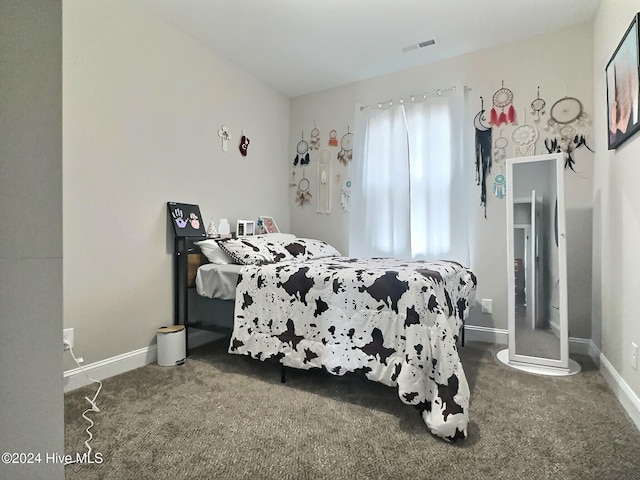 bedroom featuring carpet