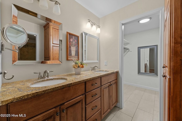 bathroom with vanity and tile patterned floors