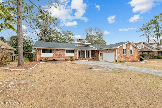 single story home featuring a front yard and a garage