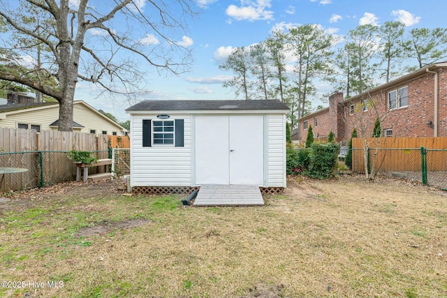 view of outbuilding featuring a yard