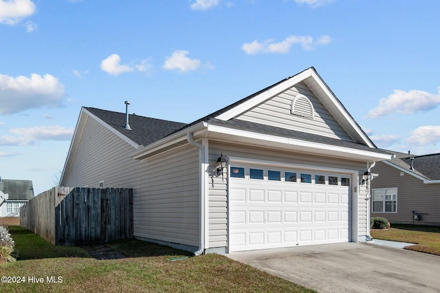 view of home's exterior with a garage