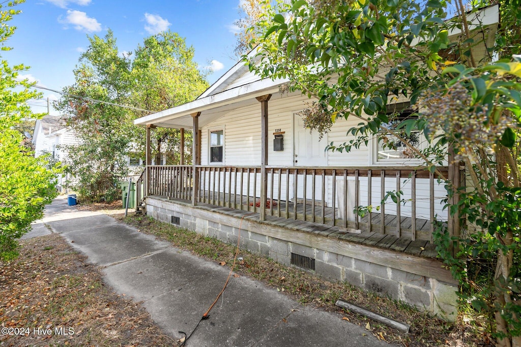 exterior space featuring covered porch