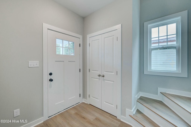 entrance foyer featuring light wood-type flooring