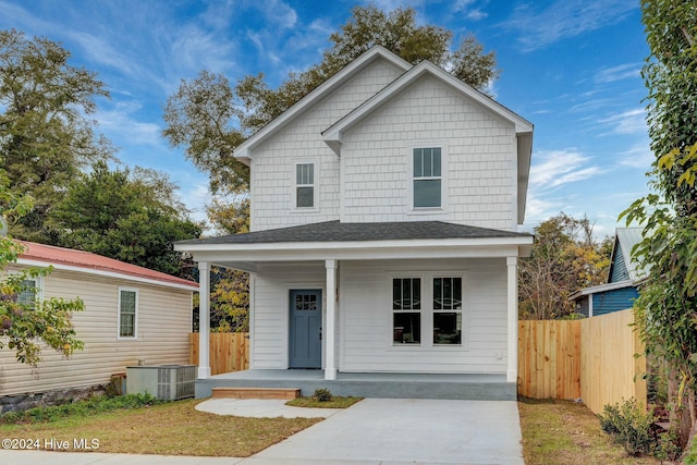 view of front of house featuring central air condition unit and a porch