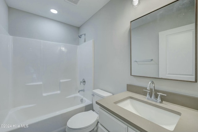 full bathroom featuring vanity, toilet, and shower / tub combination