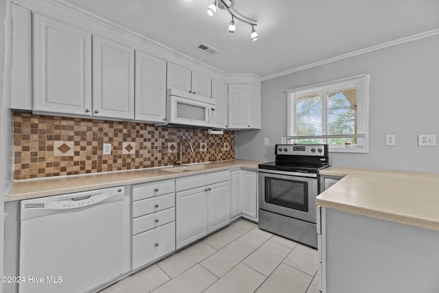 kitchen with white cabinets, sink, white appliances, and ornamental molding