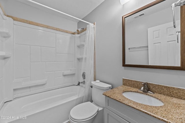 full bathroom featuring toilet, vanity, and shower / bathtub combination with curtain