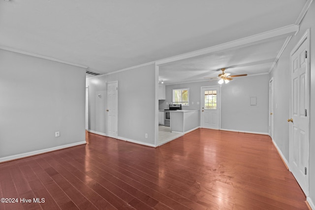 unfurnished living room with hardwood / wood-style flooring, ornamental molding, and ceiling fan