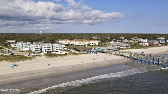 aerial view featuring a water view and a view of the beach