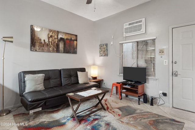 living room with ceiling fan, light tile patterned floors, and a wall mounted air conditioner