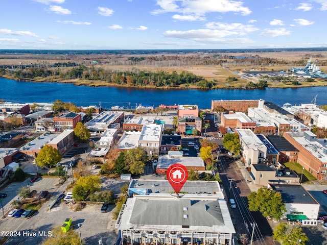 drone / aerial view with a water view