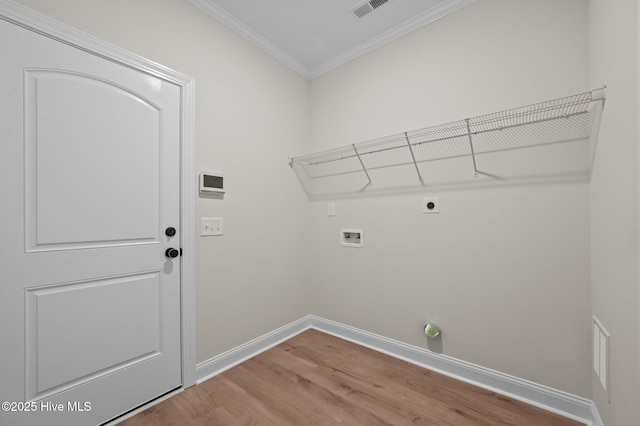 laundry area featuring washer hookup, light wood finished floors, electric dryer hookup, laundry area, and baseboards