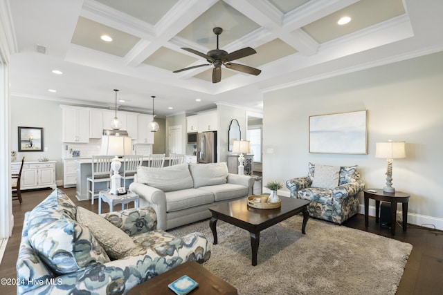 living room with beam ceiling, dark wood-type flooring, and coffered ceiling