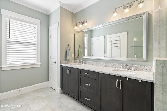 bathroom with vanity and ornamental molding