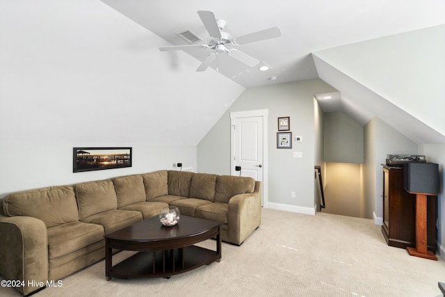 carpeted living room with ceiling fan and lofted ceiling