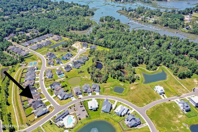 birds eye view of property featuring a water view