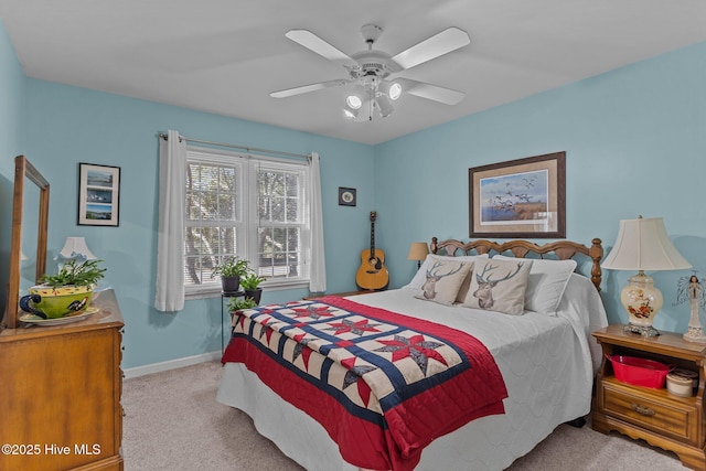 bedroom with light colored carpet and ceiling fan