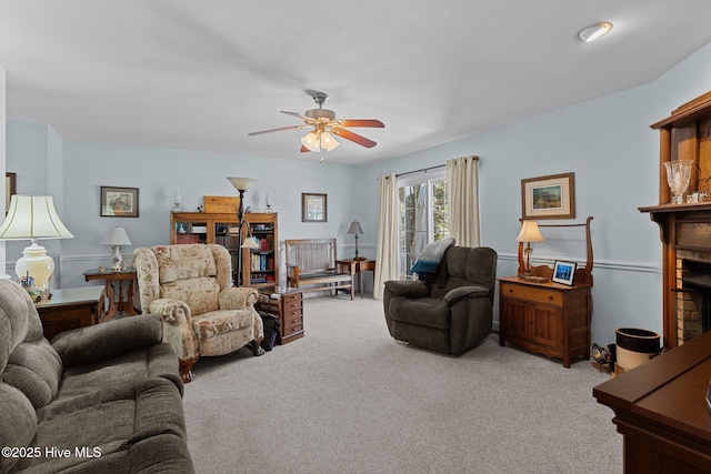 living room featuring light colored carpet and ceiling fan