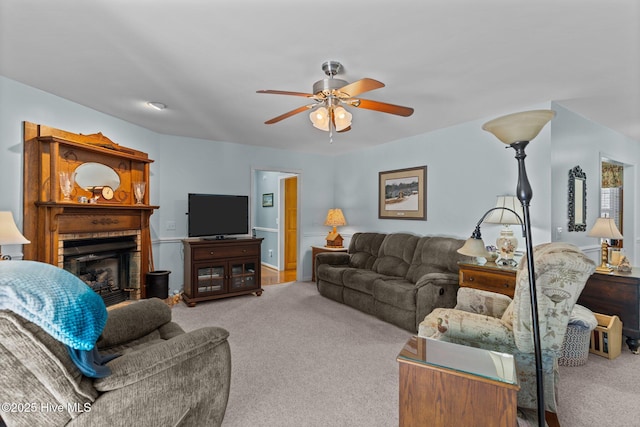 living room with ceiling fan and light carpet