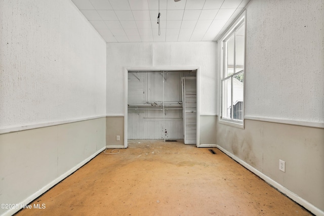 401 Pecan Ln, Lake Waccamaw, NC 28450 - unfurnished room featuring baseboards and concrete floors