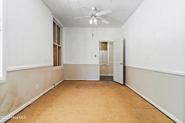 401 Pecan Ln, Lake Waccamaw, NC 28450 - spare room featuring ceiling fan and baseboards