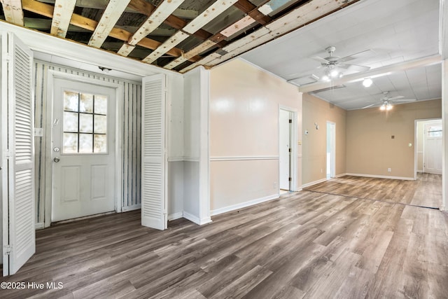 401 Pecan Ln, Lake Waccamaw, NC 28450 - foyer with a ceiling fan, plenty of natural light, and wood finished floors