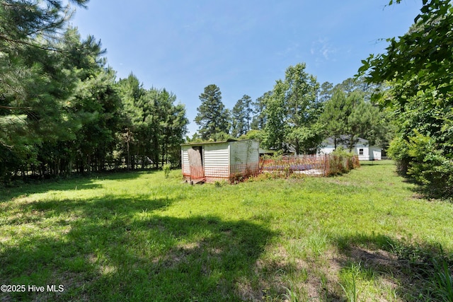 401 Pecan Ln, Lake Waccamaw, NC 28450 - view of yard featuring a shed