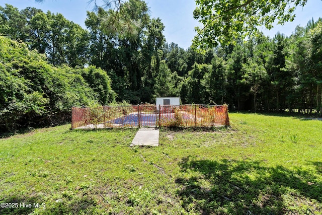 401 Pecan Ln, Lake Waccamaw, NC 28450 - view of grassy yard with an outdoor structure