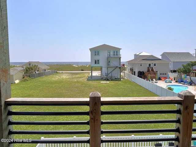 view of yard with a fenced in pool