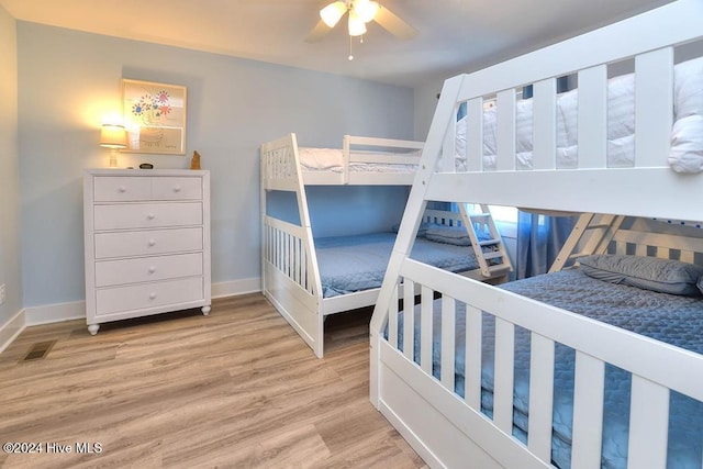 bedroom featuring ceiling fan and light wood-type flooring