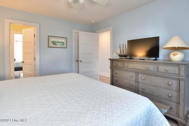 bedroom featuring ceiling fan and light hardwood / wood-style flooring