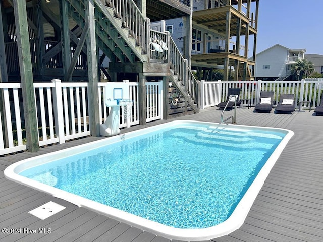 view of pool featuring a deck