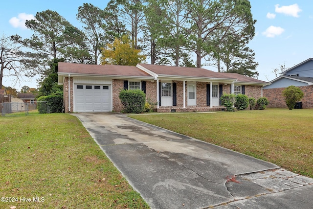 single story home with a front lawn and a garage