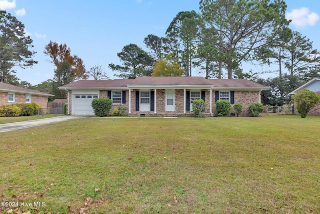 single story home with a front yard and a garage