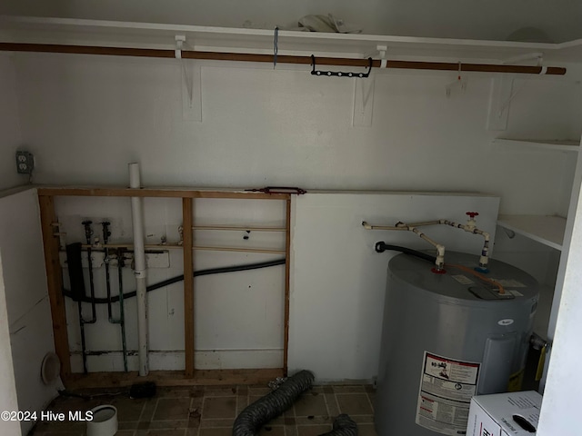 utility room with electric water heater