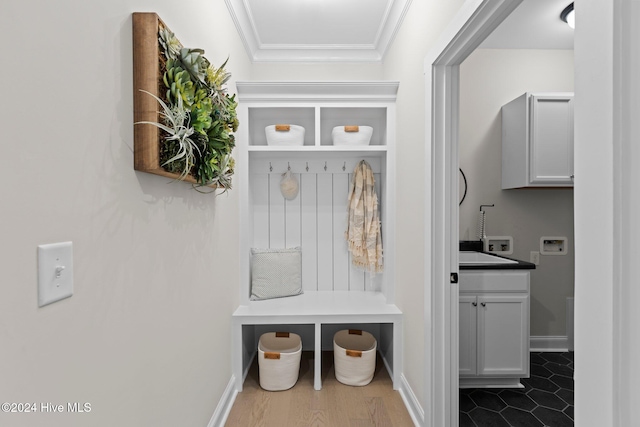 mudroom featuring crown molding and hardwood / wood-style floors