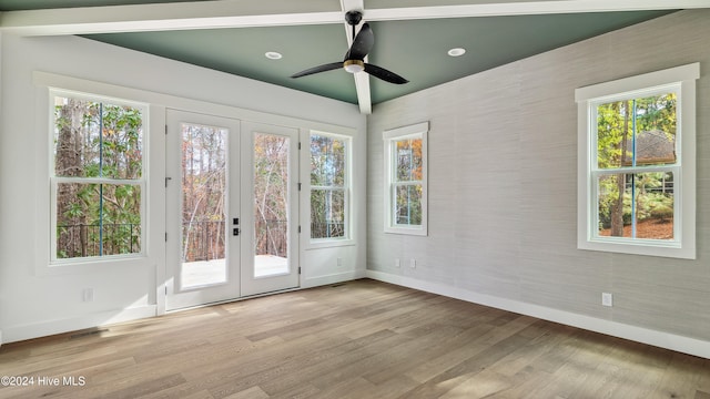 doorway featuring ceiling fan, light hardwood / wood-style floors, and french doors