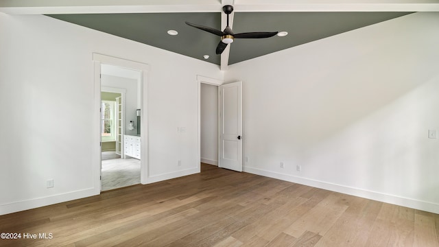 unfurnished bedroom with ceiling fan and light wood-type flooring